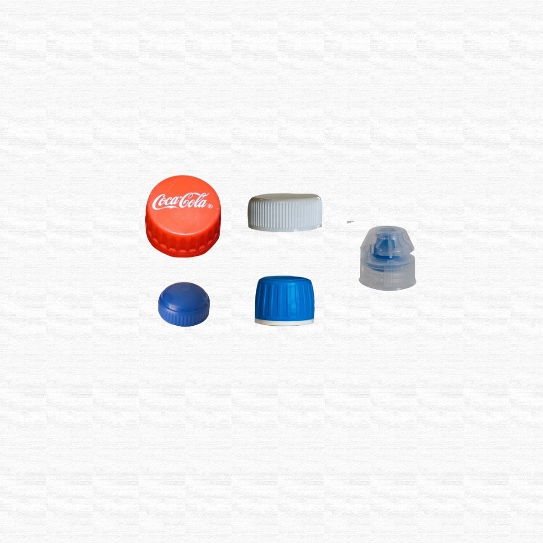 A collection of small colorful plastic bottle caps