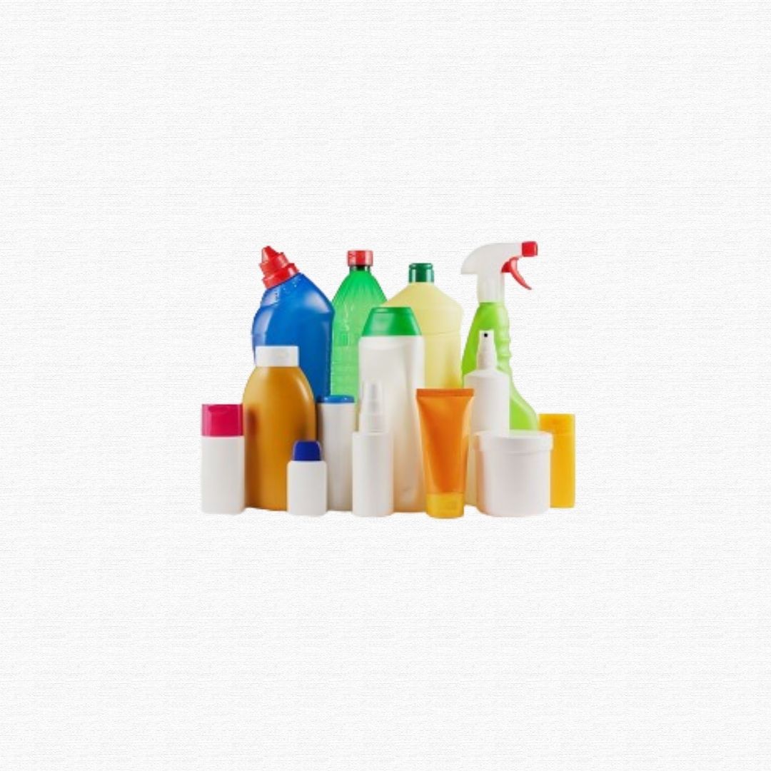 An assortment of plastic household cleaning spray bottles