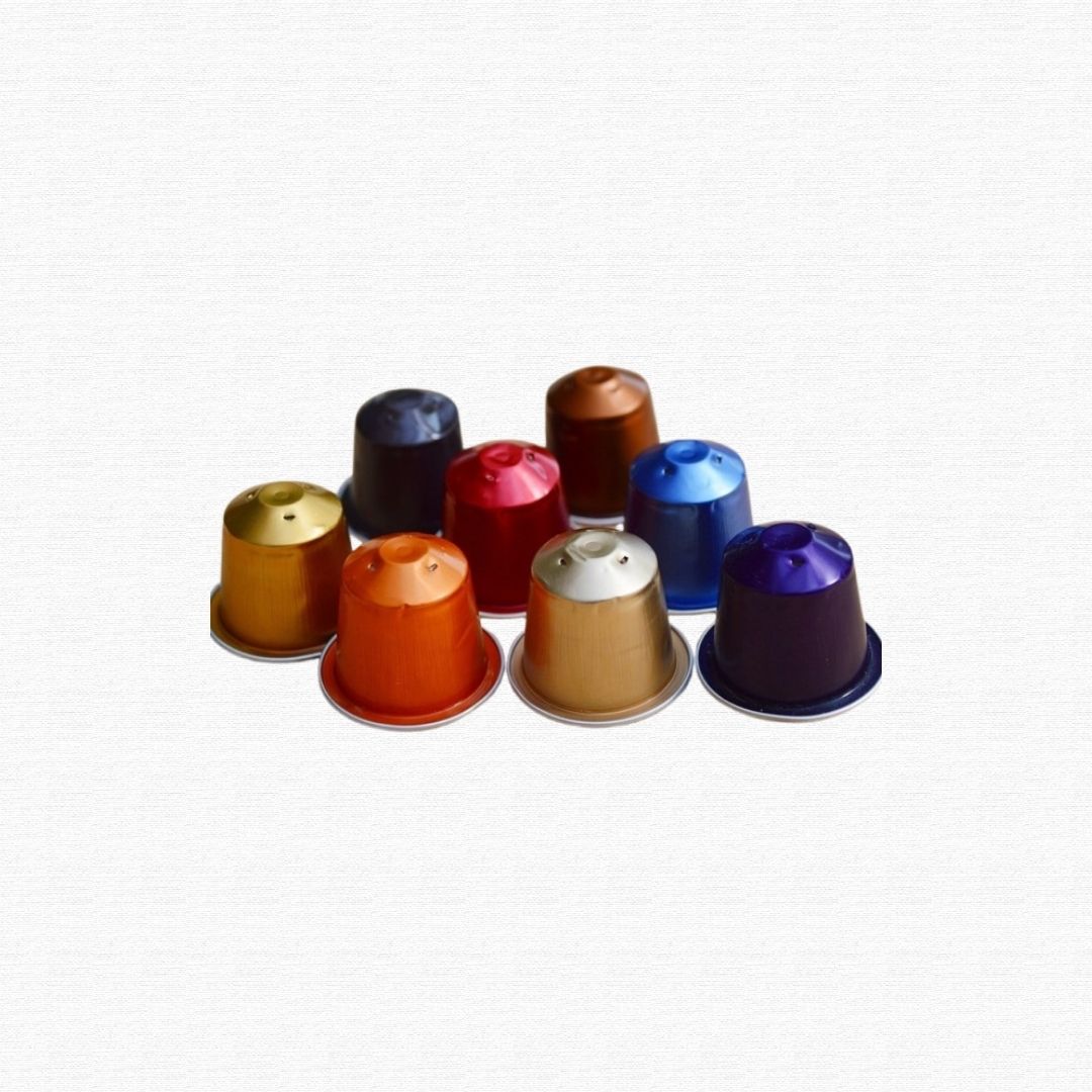 A collection of used single-serve plastic coffee pods