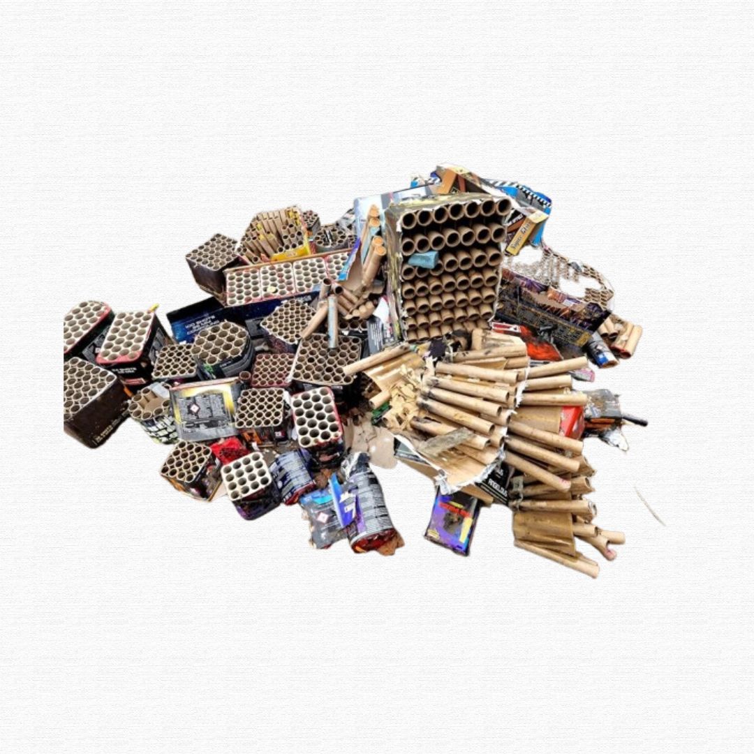 A collection of unused fireworks and pyrotechnic devices.