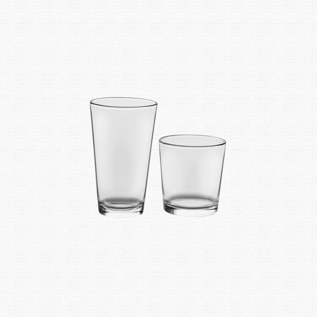 An assortment of household glass dishware and kitchen glassware
