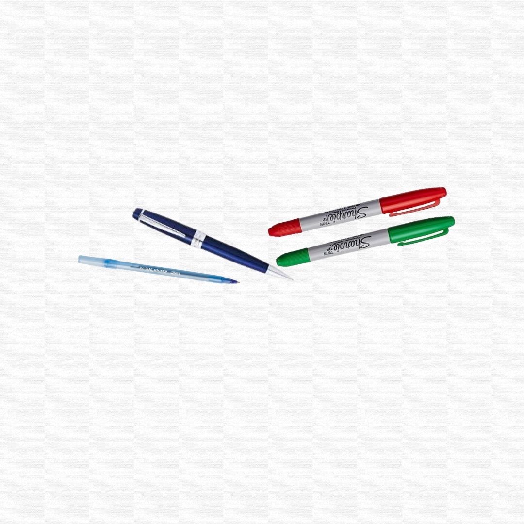 A selection of colorful permanent markers and plastic ballpoint pens.