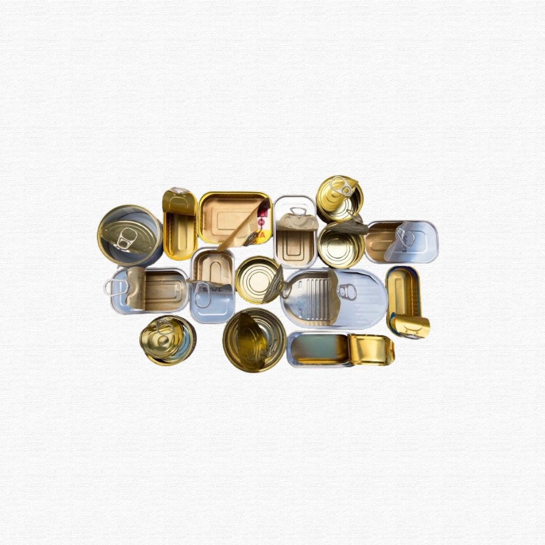 Empty tin-plated steel food cans with lids removed